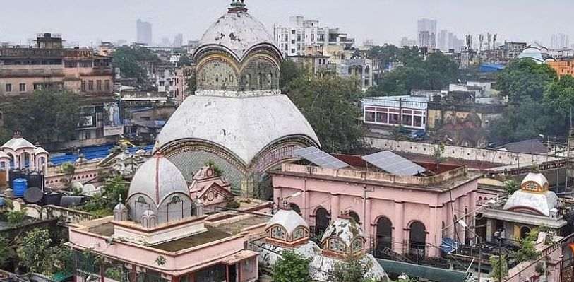 Aerial view of Kalighat Kali Temple complex in Kolkata showcasing the iconic white domes and surrounding buildings