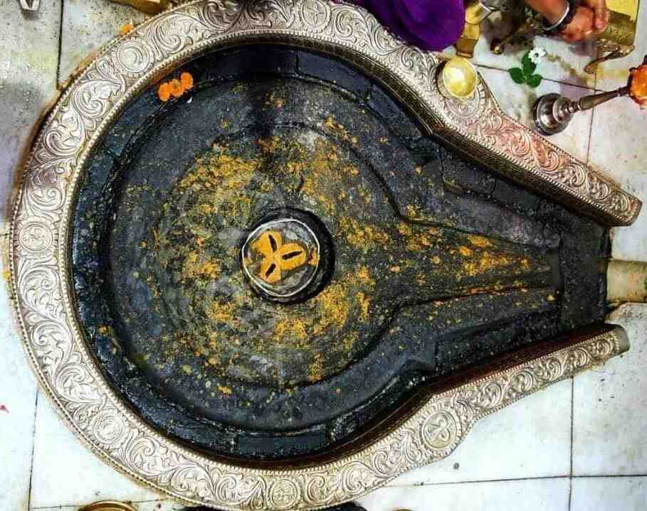 Sacred Trimbakeshwar Jyotirlinga inside Trimbakeshwar Temple near Nashik, representing the Trimurti of Brahma, Vishnu, and Shiva
