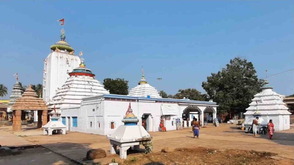 Biraja Devi Temple main complex in Jajpur Odisha with white temple structures and tall shikhara