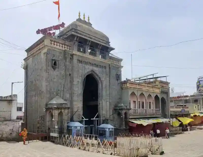 Main entrance gateway of Tulja Bhavani Temple in Tuljapur Maharashtra with stone architecture