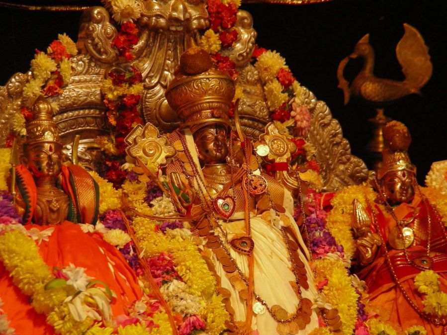 Sita Ramachandraswamy idol with Sita and Lakshmana at Bhadrachalam Temple decorated with flowers and ornaments