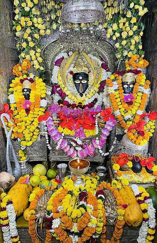 Bagalamukhi Mata Temple entrance in Kolkata with devotees visiting the sacred shrine of Goddess Bagalamukhi