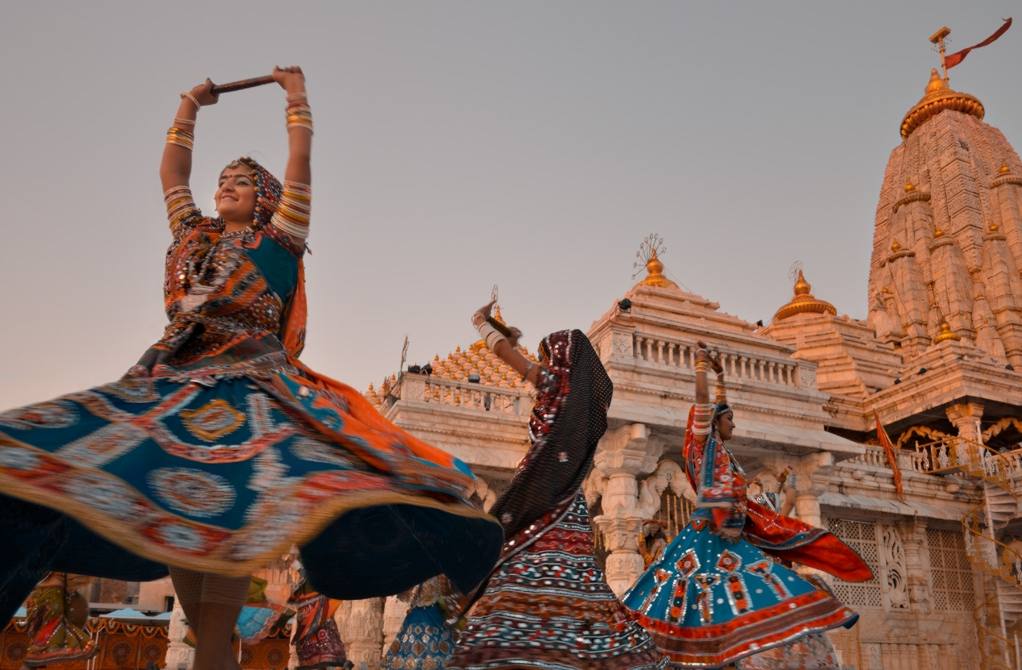 Devotees performing traditional Garba dance during Navratri festival at Ambaji Temple Gujarat