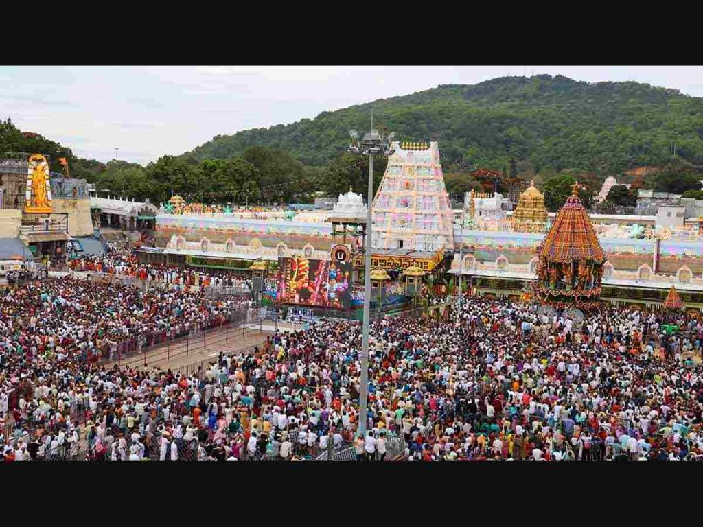 Huge crowd of pilgrims gathered outside Tirumala Tirupati Balaji Temple waiting for darshan of Lord Venkateswara.