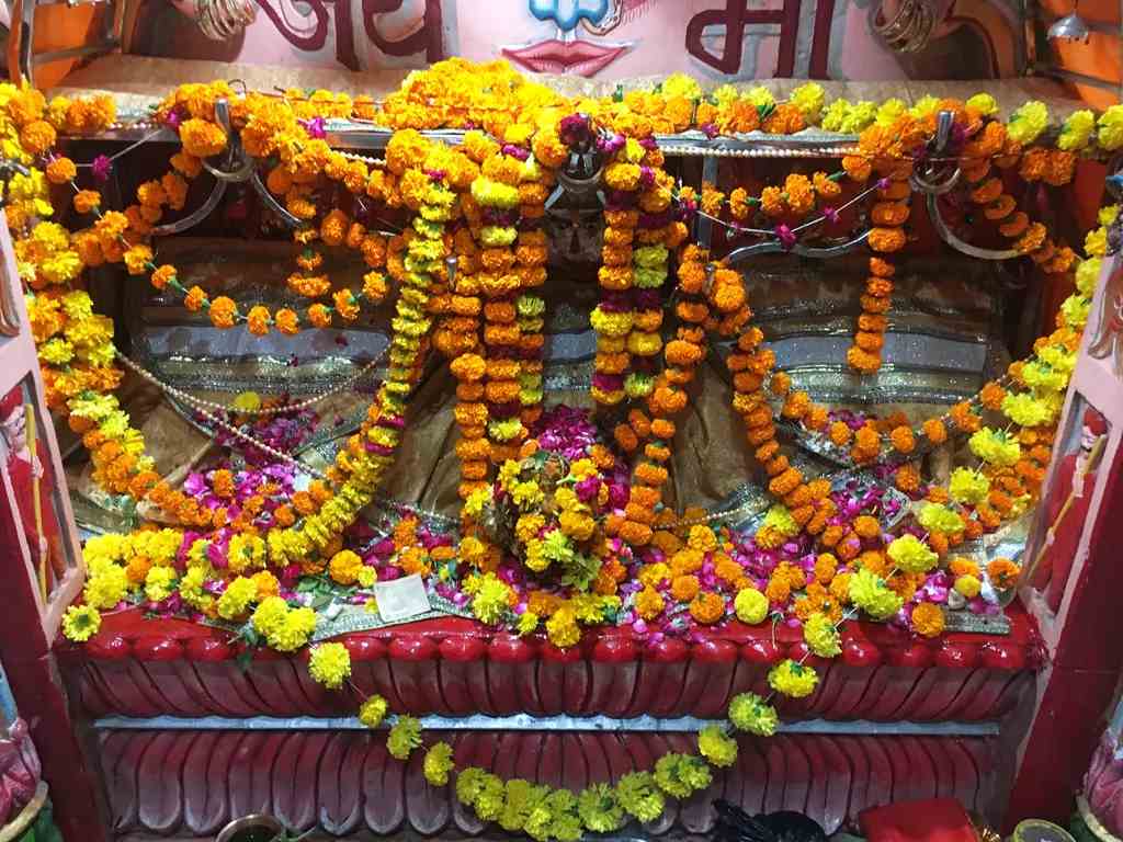 Manibandh Shakti Peeth sacred shrine decorated with marigold garlands Pushkar Rajasthan