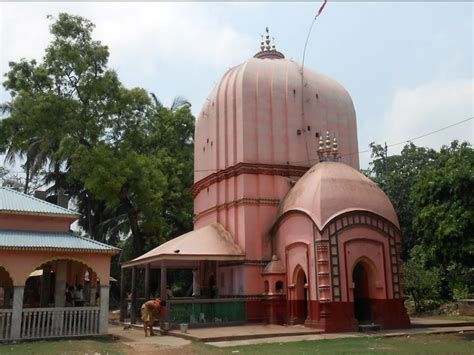 Ratnavali Shakti Peeth temple exterior in Maharashtra with pink dome architecture and surrounding greenery