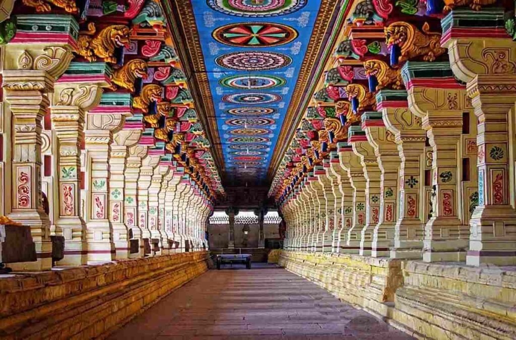 Colorful pillared corridor inside Srivilliputhur Andal Temple with detailed ceiling art