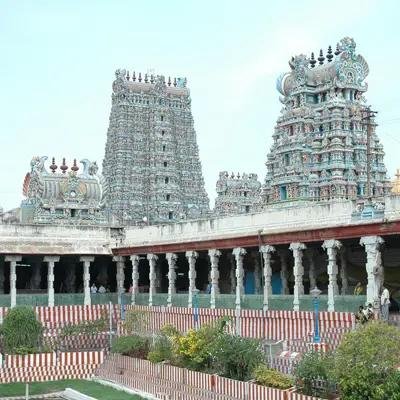 Ancient Dravidian architecture of Palani Murugan Temple with intricately carved gopurams in Tamil Nadu.