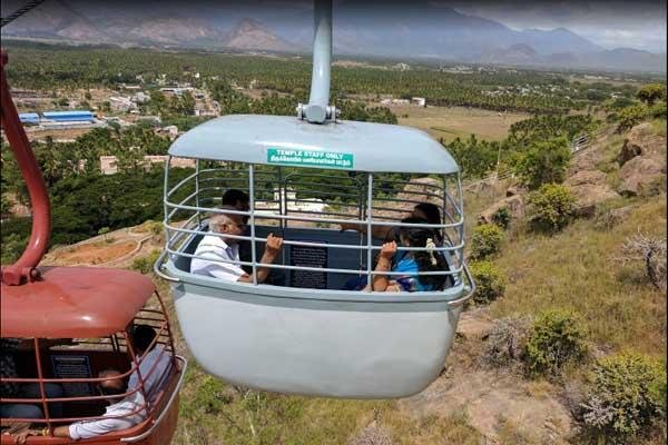 Devotees enjoying the rope car ride to Palani Murugan Temple hilltop.